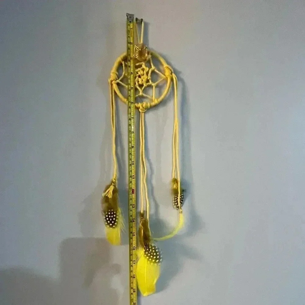 Lorena Espinoza Designs handmade yellow dream catcher with gemstone